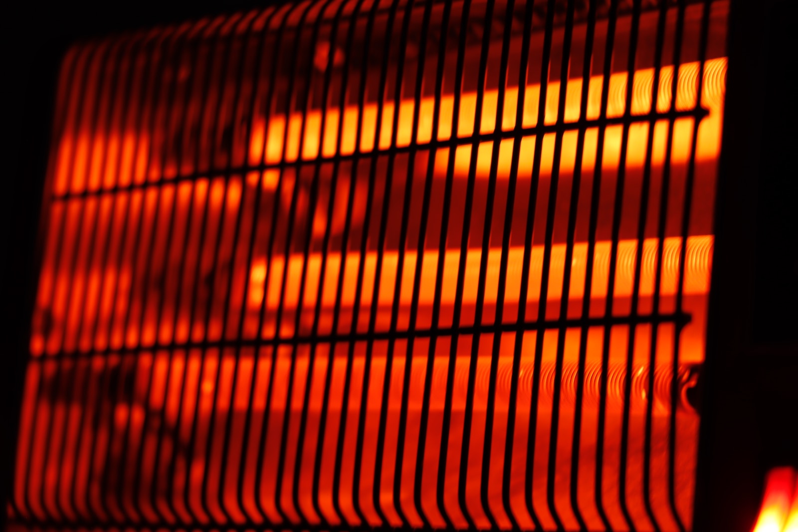 a close up of a heater in the dark
