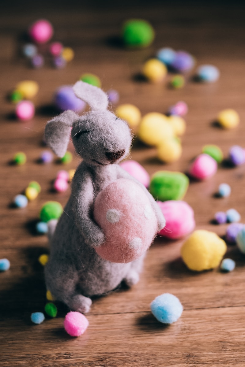 closeup photo of gray rabbit plush toy