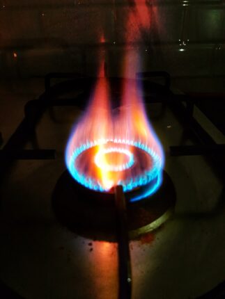 blue and red flame on black metal frame